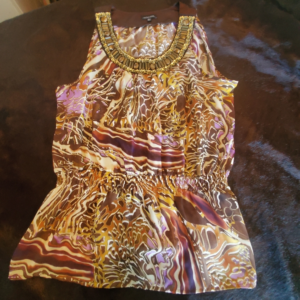 Bejeweled sleeveless blouse